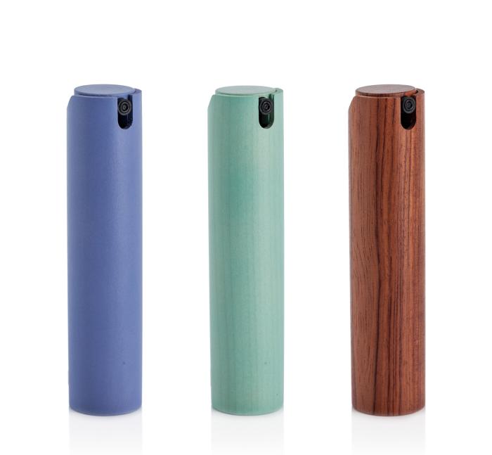 Quadpack's wooden travel perfume packs offer an elegant and sustainable solution